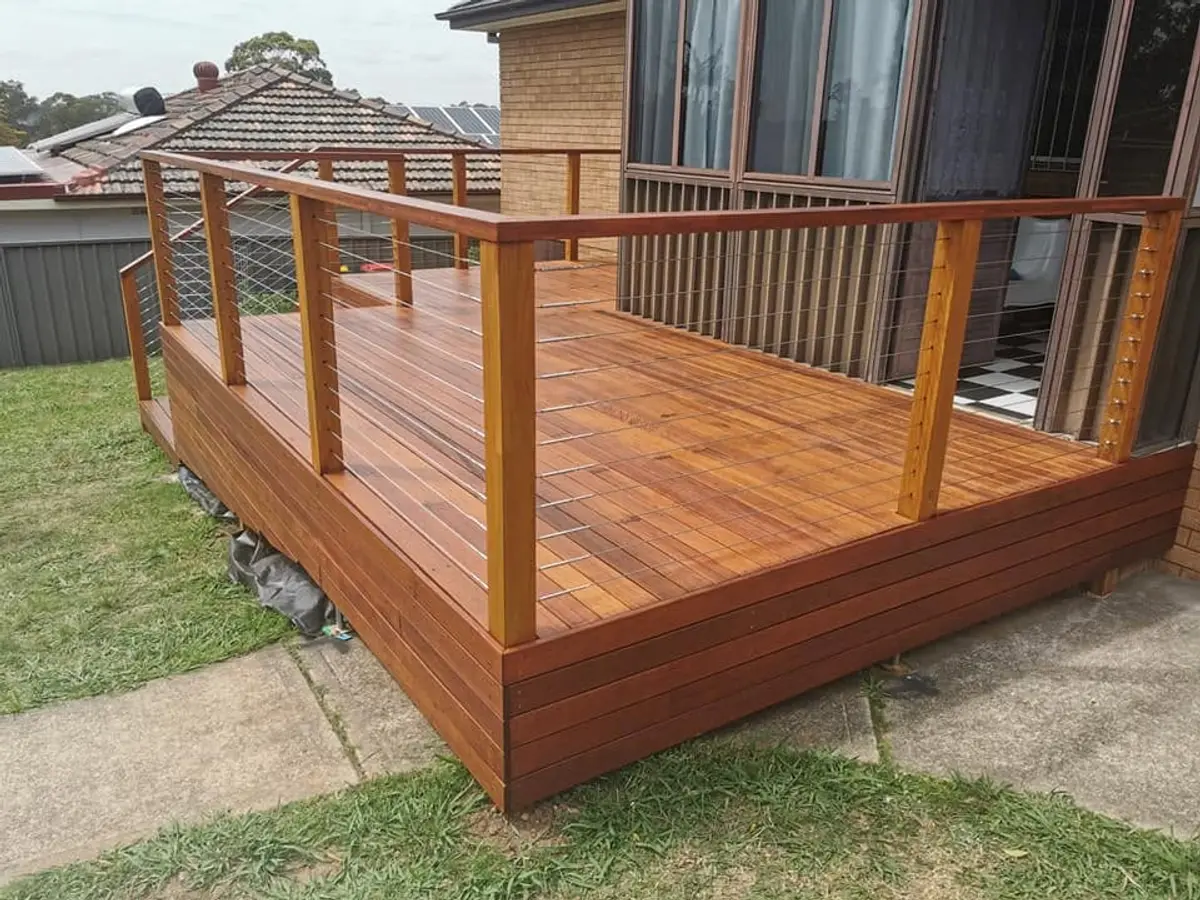 Raised deck with skirt fascia and balustrade