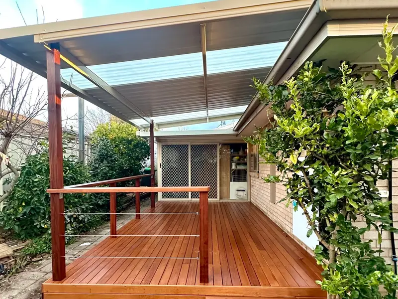 Open Pergola to All-Weather Covered Deck — completed deck